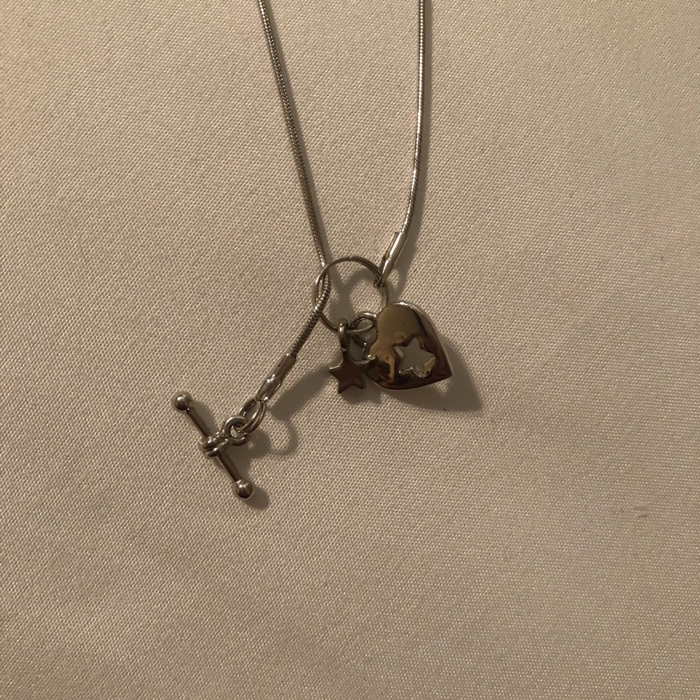 A heart and star cut out necklace